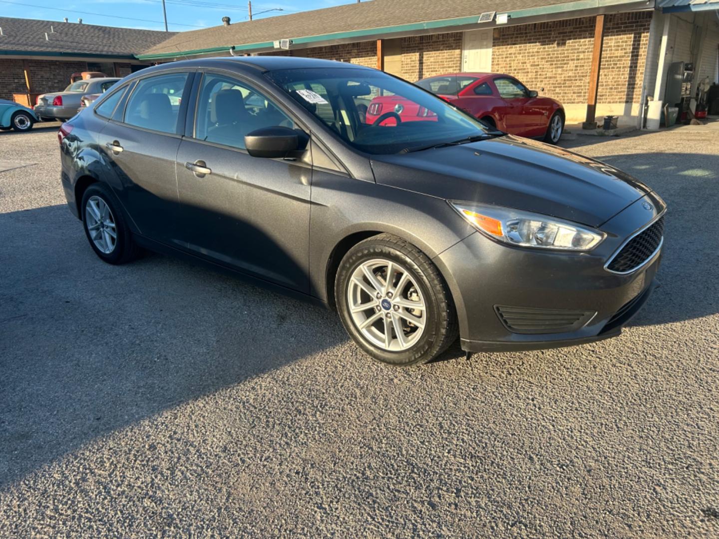 2018 Grey Ford Focus (1FADP3F24JL) , located at 1687 Business 35 S, New Braunfels, TX, 78130, (830) 625-7159, 29.655487, -98.051491 - Photo#3